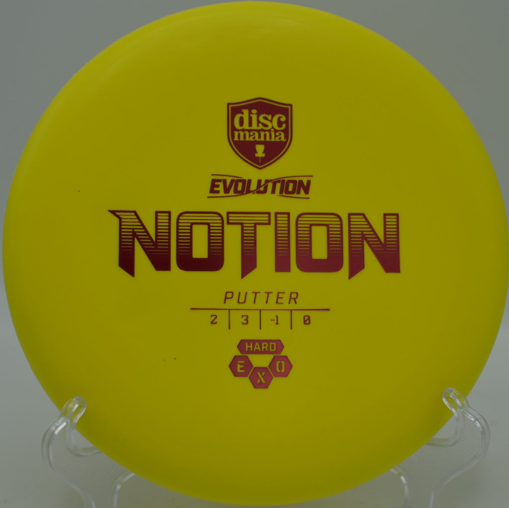 Close-up of the flat-topped Exo Hard Notion gripped for a confident circle putt at Maple Hill Disc Golf Course in Leicester, Massachusetts.