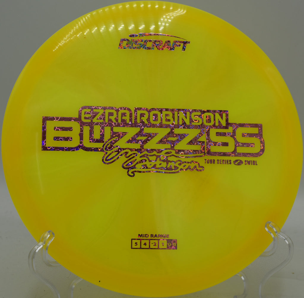 Buzzz SS held in a fan grip before a clean release at Creekside Disc Golf Course in Salt Lake City, Utah

