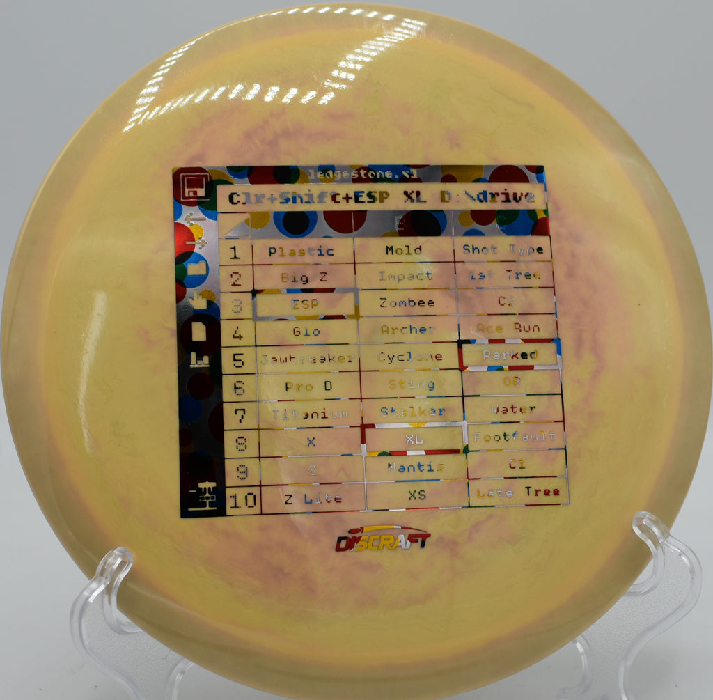 Discraft XL in ESP Colorshift plastic glowing in golden hour at Blue Ribbon Pines in East Bethel, Minnesota