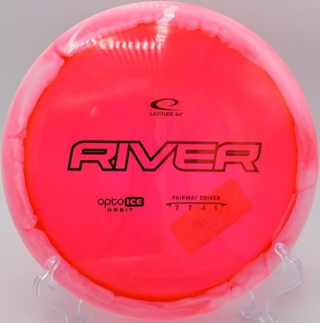 Opto Ice Orbit River flying on a glidey hyzer flip at BlueGill DGC in Wayland, Michigan.

