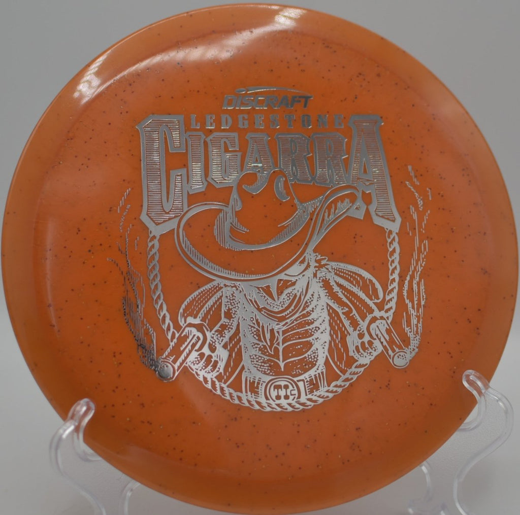 Discraft Ti Sparkle Cigarra fairway driver delivering smooth glide and dependable fade at Toboggan Disc Golf Course in Milford, Michigan