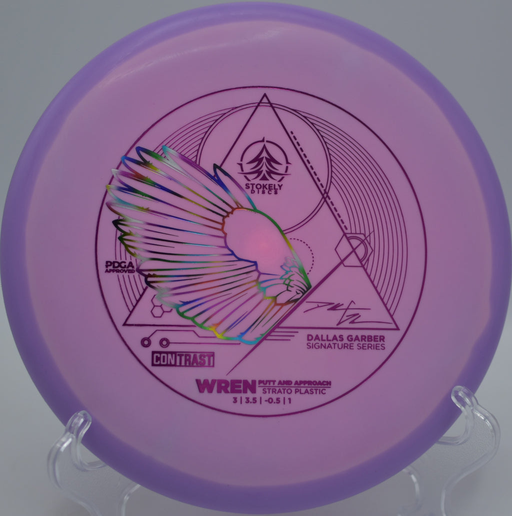 Stokely Discs Strato Wren holding a dead-straight line toward the basket at Chickasaw Trace Park Disc Golf Course in Columbia, Tennessee.