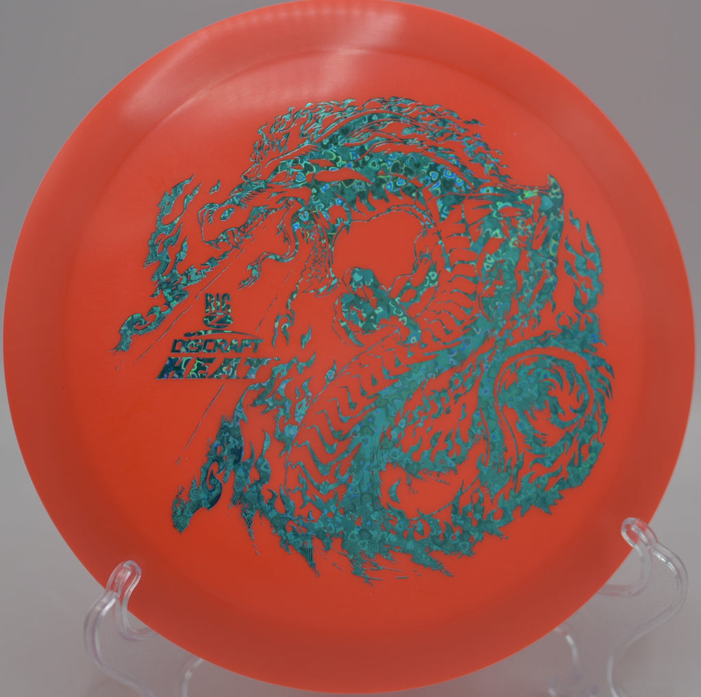 Discraft Big Z Heat gliding on a long turnover line at Ann Morrison Park Disc Golf Course in Boise, Idaho.