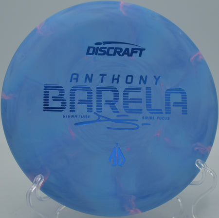 Discraft CT Swirl Focus Anthony Barela Tour Series gliding on a soft approach at Creekside Disc Golf Course in Salt Lake City, Utah.