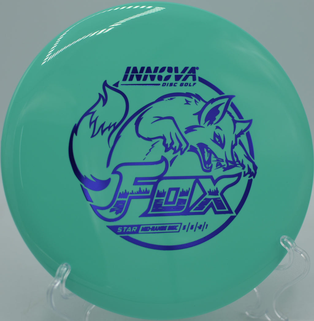 Player gripping a Star Fox fairway driver before release at Cedar Hill Disc Golf Course in Nashville, Tennessee.