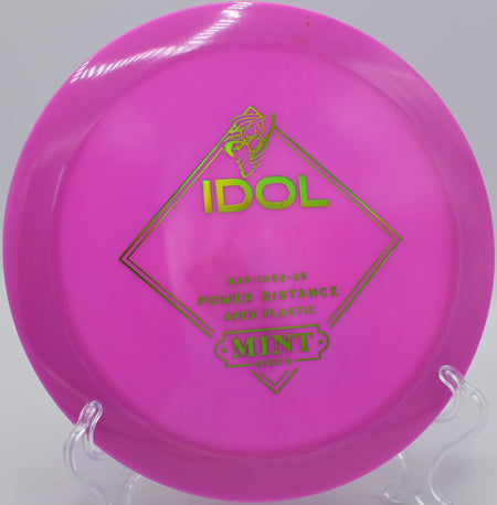 Mint Discs Apex Idol disc flying a power backhand at Blue Ribbon Pines Disc Golf Course in East Bethel, Minnesota