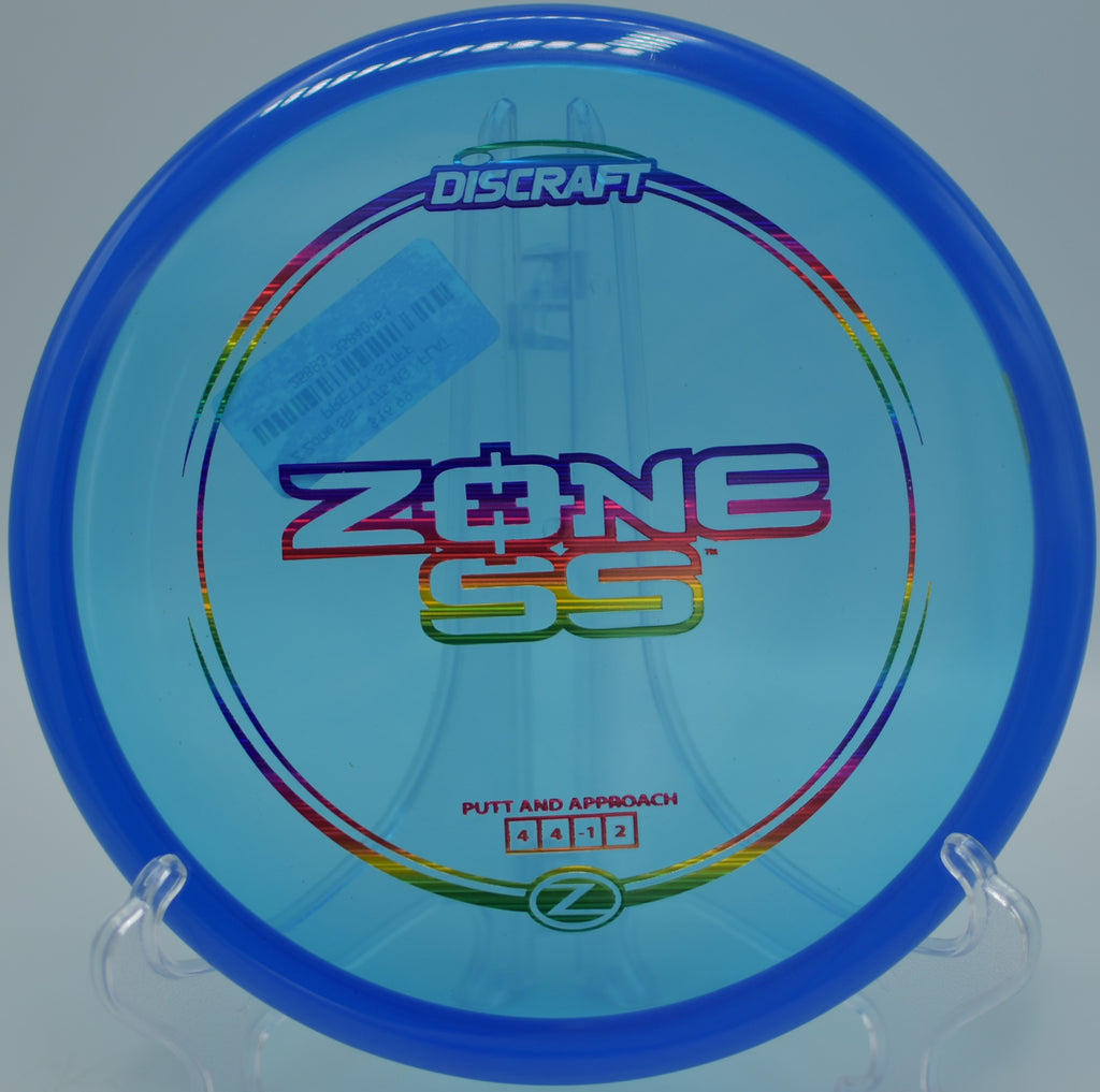Player executing a forehand upshot with the Discraft Z Zone SS at Huntington Beach Disc Golf Course in Huntington Beach, California.