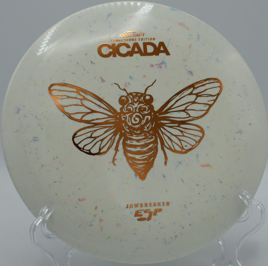 Jawbreaker ESP Cicada resting under cloudy skies at Fox Run Meadows in Jeffersonville, Vermont, with consistent performance and comfortable grip.

