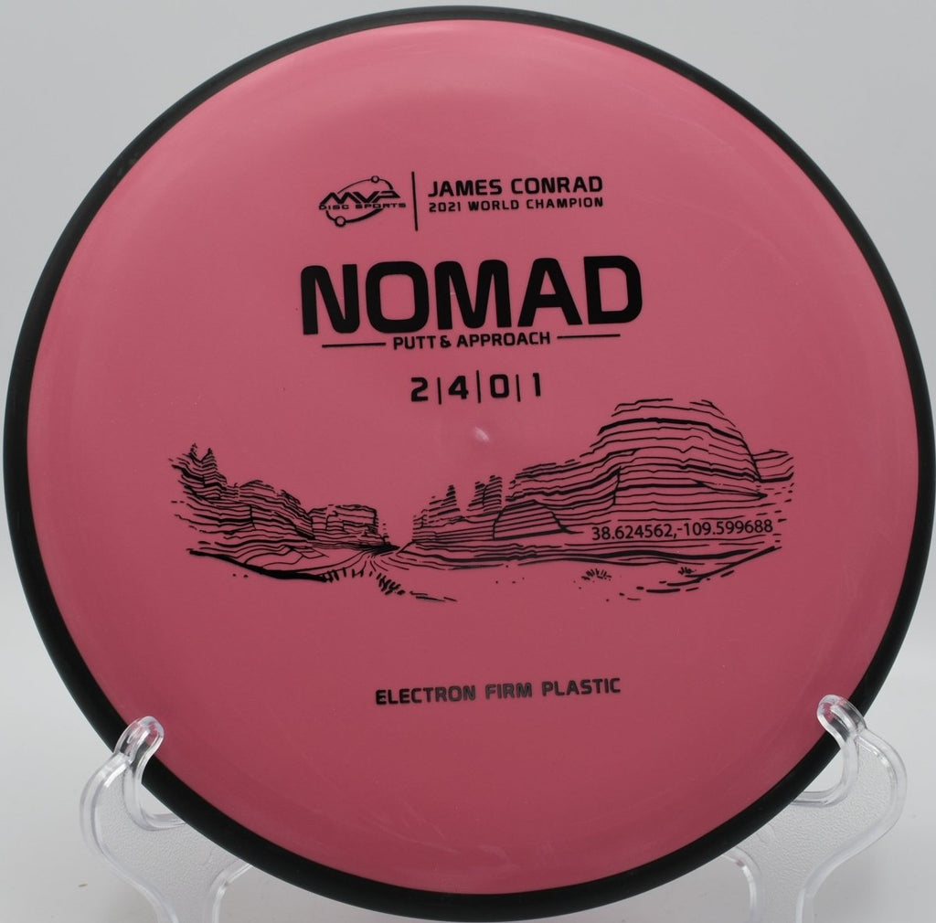 MVP Electron Firm Nomad putter sitting on the putting green ready for a tap-in putt at Noble Park Disc Golf Course in Paducah, Kentucky