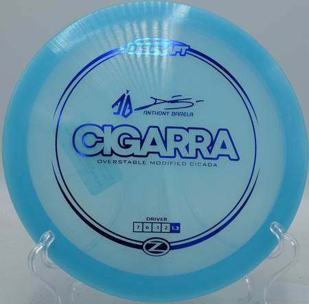 Discraft Cigarra carving a long turnover through the woods at Harmon Hills in Fall Branch, Tennessee

