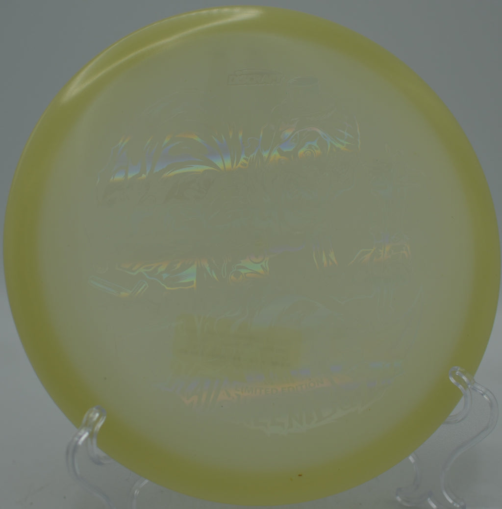 2025 Limited Edition Halloween Single Stamped Mega Glo Buzzz glowing across open fairways at Two Rivers Disc Golf Course in Nashville, Tennessee.