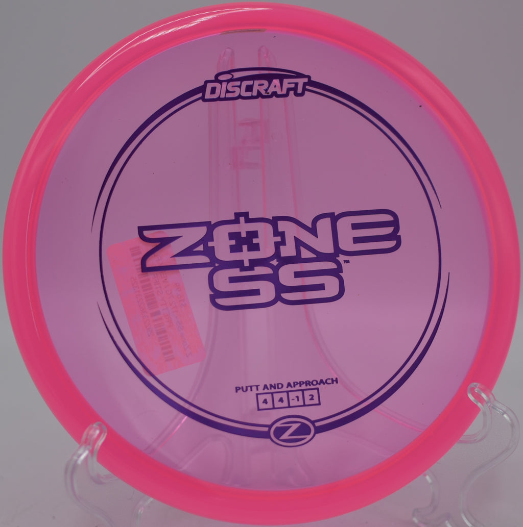 Discraft Z Zone SS flying arrow-straight at Blue Ribbon Pines Disc Golf Course in East Bethel, Minnesota.