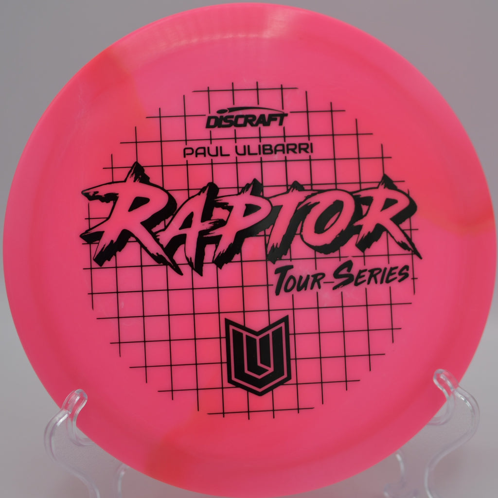 2022 ESP Swirl Raptor (Paul Ulibarri) carving a controlled hyzer line at Blue Ribbon Pines Disc Golf Course in East Bethel, Minnesota, highlighting its premium grip and dependable overstability.