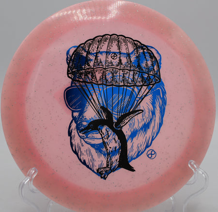 Infinite Discs Metal Flake Glow C-Blend X-Out Pharaoh glowing disc smashing full power drives at Water Works Park Disc Golf Course in Kansas City, Missouri.