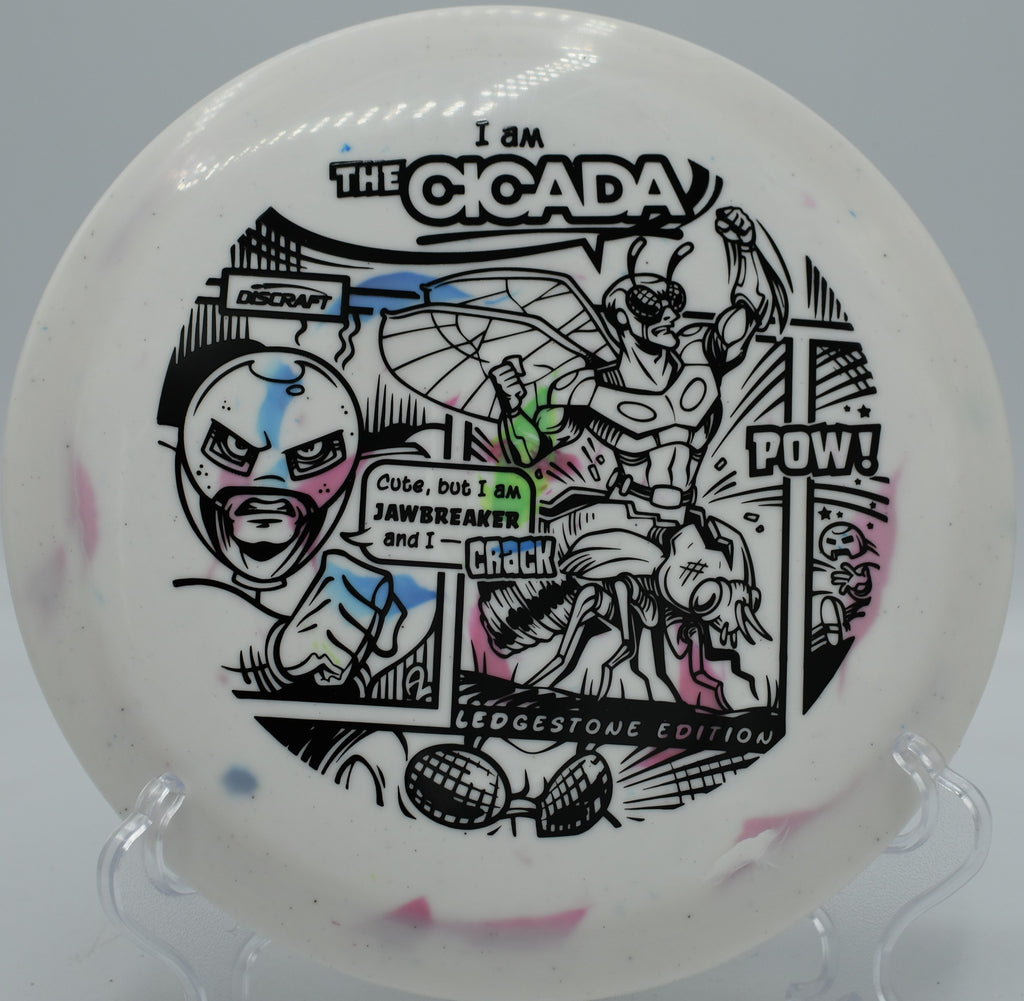 Jawbreaker Lite Cicada launched on a straight control drive at Adair Park Disc Golf Course in Corvallis, Oregon, glowing in the late afternoon sun with beautiful jawbreaker swirls.