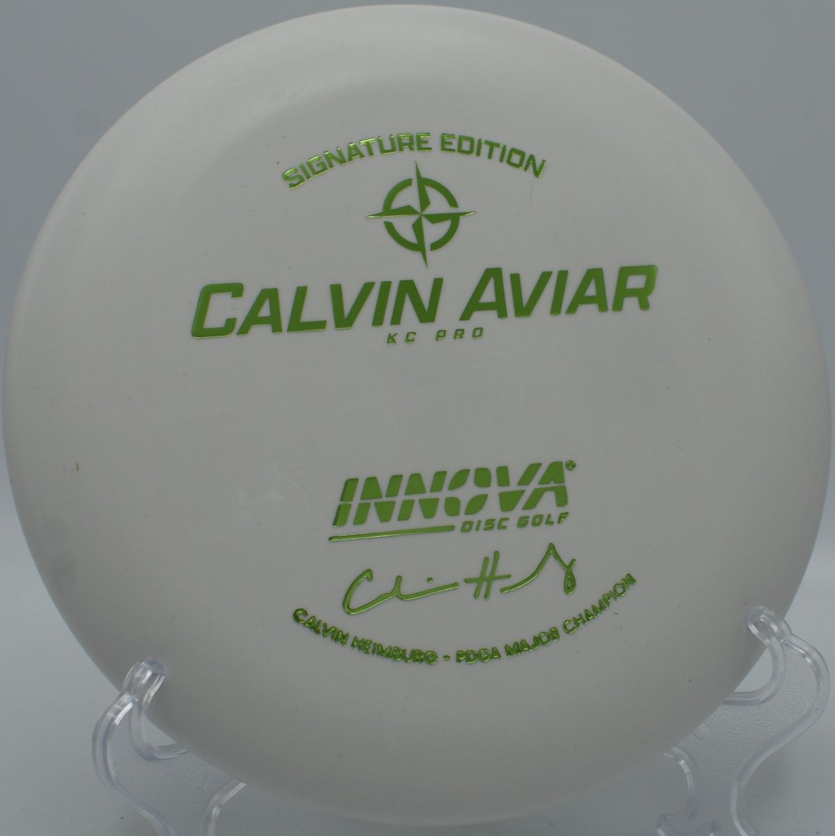 Calvin KC Pro Aviar putter parked under basket chains after a confident circle-1 putt at Winthrop University Disc Golf Course in Rock Hill, South Carolina