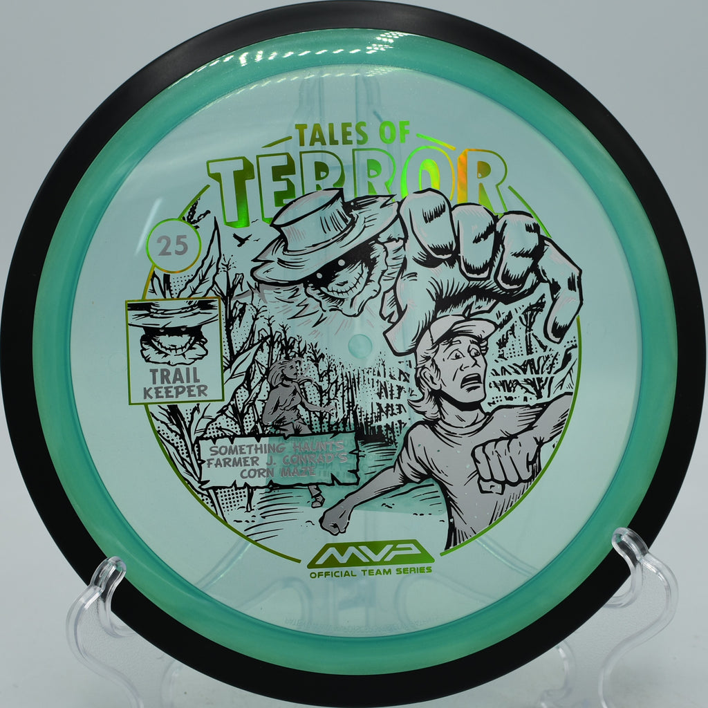 Proton Trail disc with MVP Halloween 2025 stamp thrown downhill at Gateway Green Disc Golf Course in Oregon.