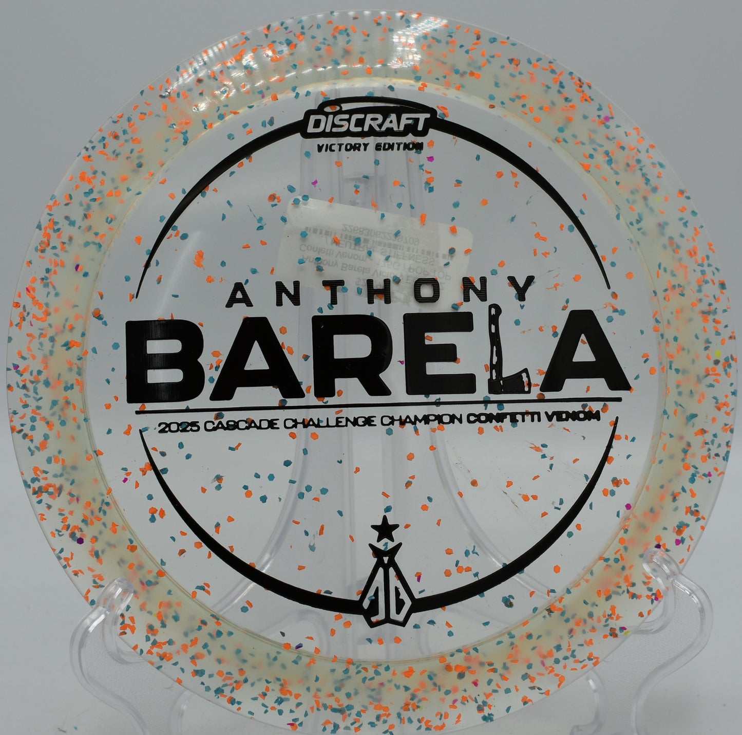 Discraft Victory Edition Venom held in fan grip before launch at Milo McIver State Park in Estacada, Oregon

