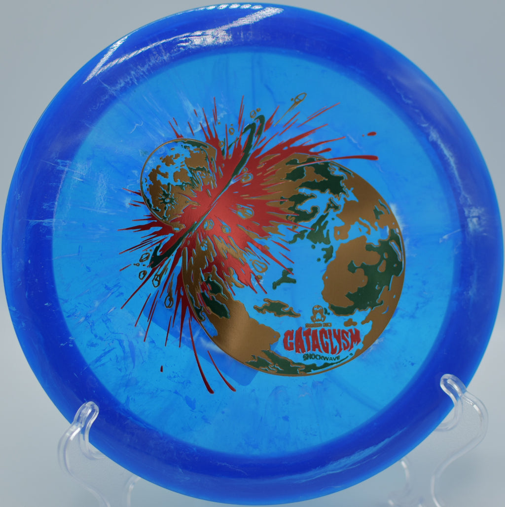 Doomsday Shockwave Cataclysm ripping a flex forehand at Hidden Ridge DGC in Clancy, MT, fighting torque and fading out with authority.