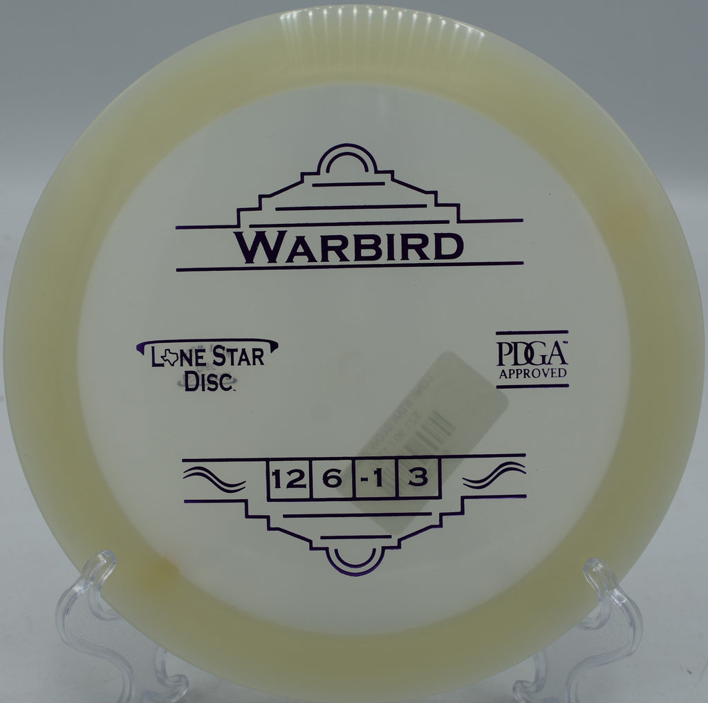 "Glow Warbird disc cutting through the air with power in Austin, Texas, perfect for long-distance drives and controlled fade."
