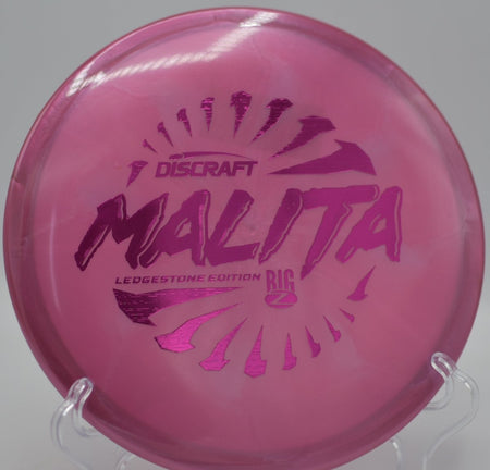 Discraft Big Z Swirl Malita midrange flying laser straight on a placement drive at Pier Park Disc Golf Course in Portland, Oregon