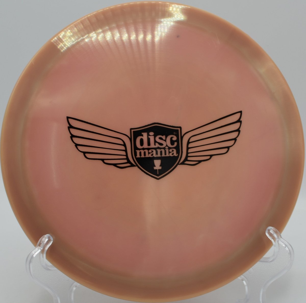 Swirly Star FD2 fairway driver threading a controlled laser line at Harmon Hills Disc Golf Course in Fall Branch, Tennessee, showcasing stable control, forward-pushing glide, torque resistance, and precise placement for high-level disc golf fairway shots