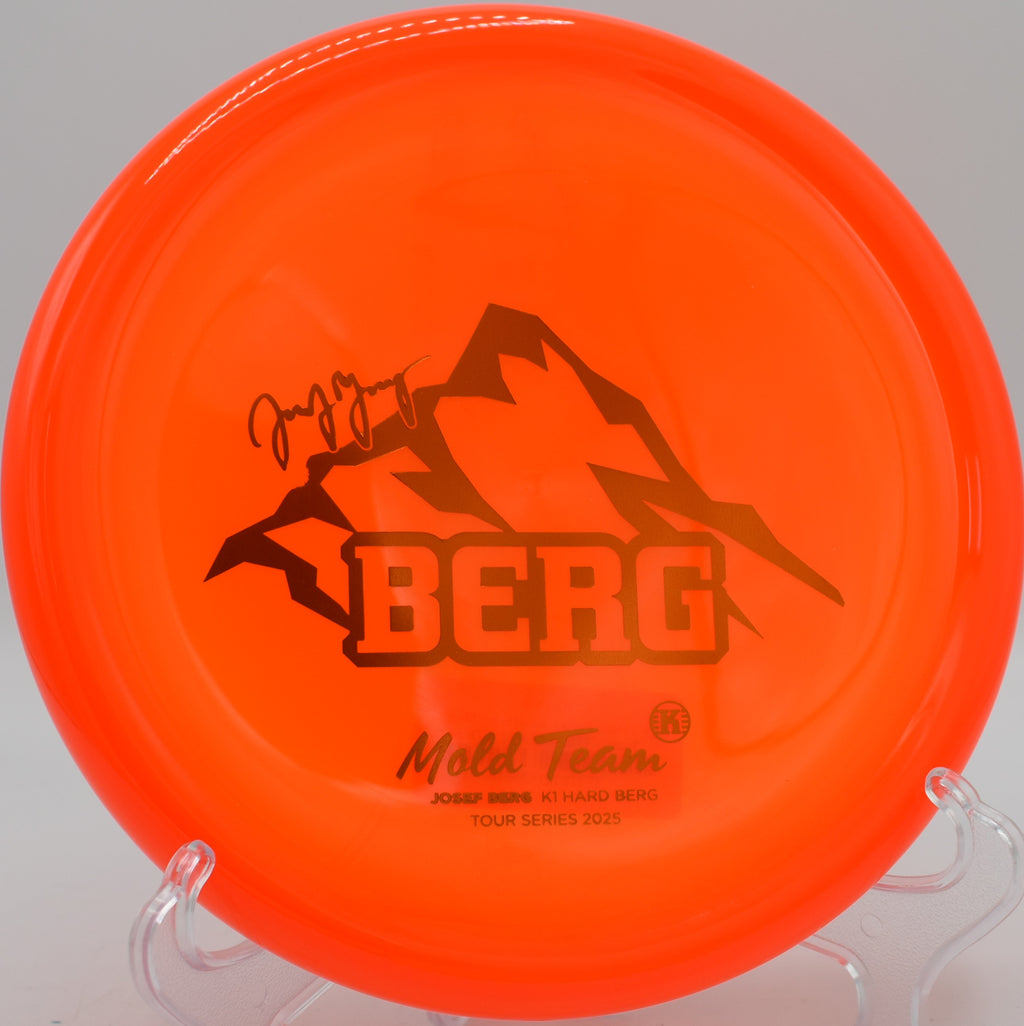 Kastaplast K1 Hard Berg floating in a headwind at Sabattus Disc Golf Course in Sabattus, Maine, showing off its torque resistance and predictable fade.

