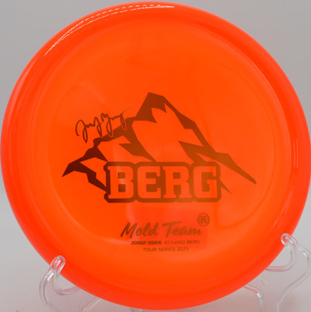 Kastaplast K1 Hard Berg floating in a headwind at Sabattus Disc Golf Course in Sabattus, Maine, showing off its torque resistance and predictable fade.

