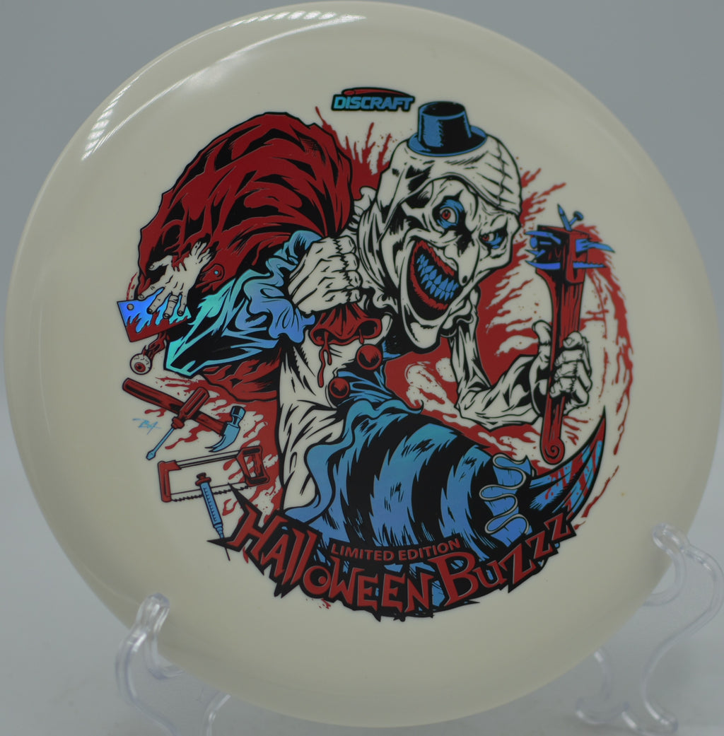 2025 Limited Edition Halloween Glo Triple Stamped Buzzz glowing bright at Veterans Memorial Disc Golf Course in Sylmar, California.