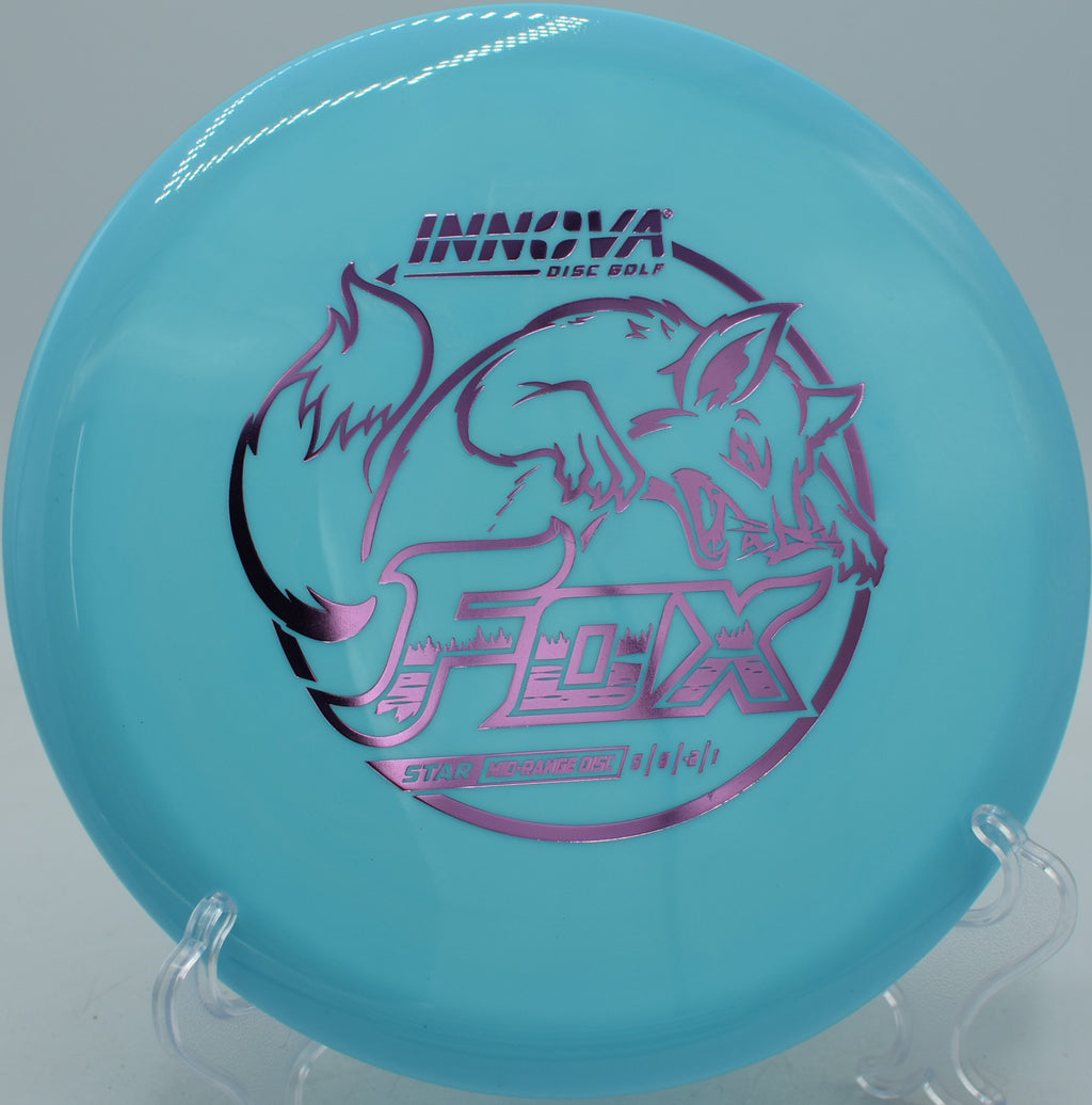 Star Fox Innova midrange settling softly into chains at DeLaveaga Disc Golf Course in Santa Cruz, California.