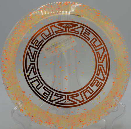 Discraft Confetti Z Zeus exploding off the tee at Eagle’s Crossing Disc Golf Course in Hawk Point, Missouri