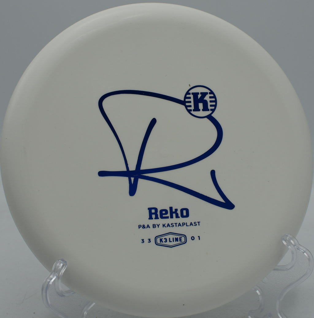 K3 Reko Kastaplast durable putter used for a jump putt at Blue Ribbon Pines Disc Golf Course in East Bethel, Minnesota.