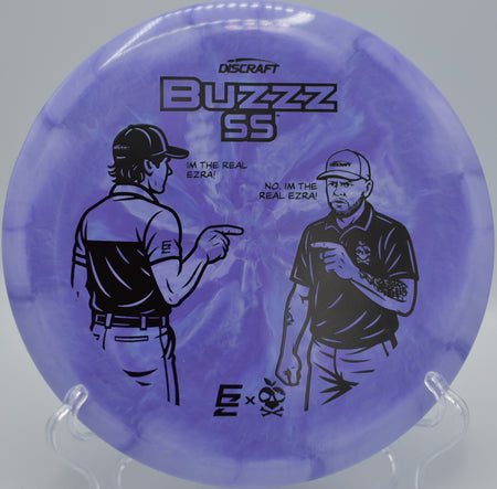 Ezra Aderhold & Robinson ESP Buzzz SS gliding between pines at Hornets Nest Disc Golf Course in Charlotte, North Carolina.