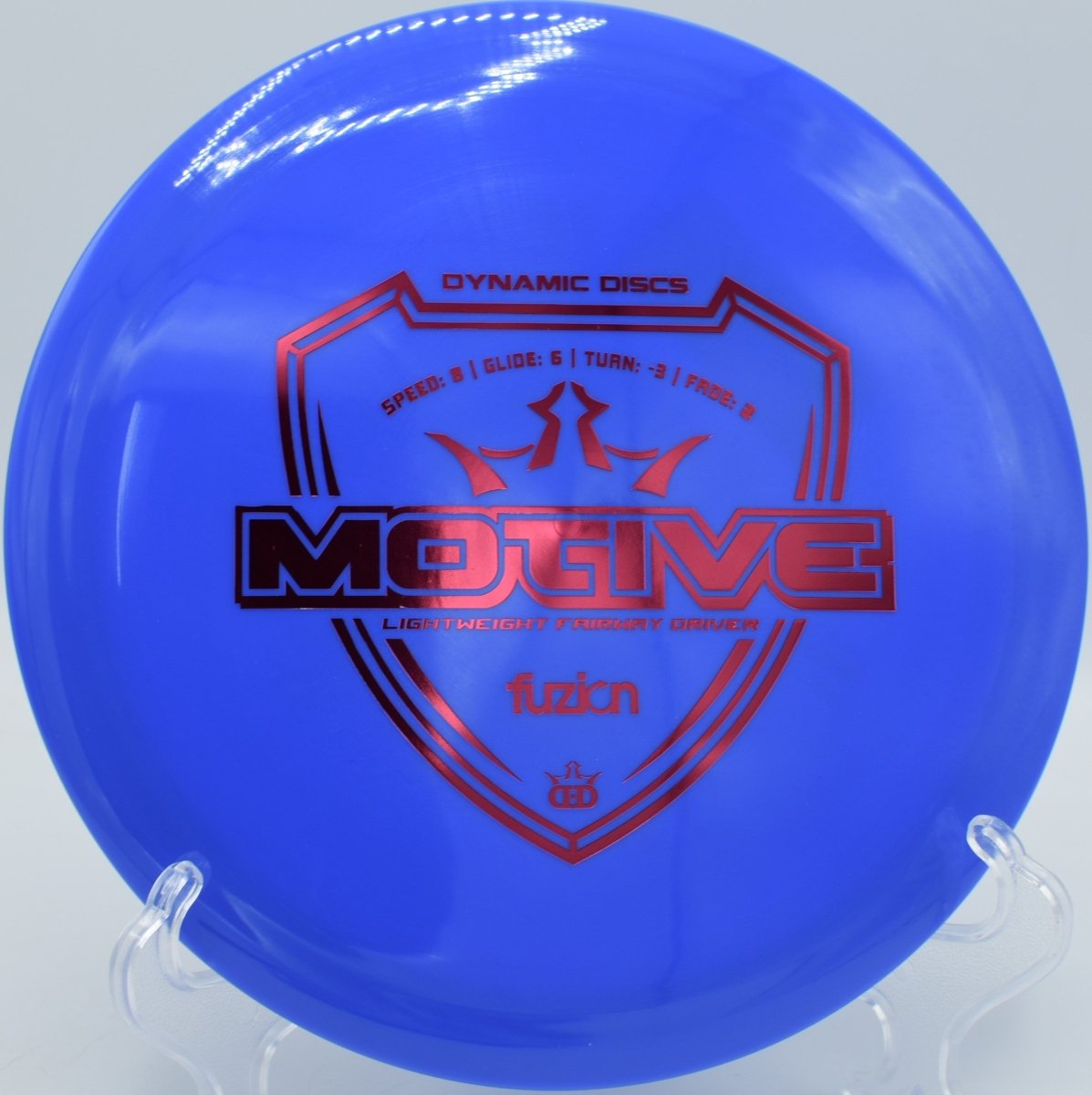 Dynamic Discs Fuzion Motive understable driver shaping long turnover at Maple Hill Disc Golf Course Massachusetts