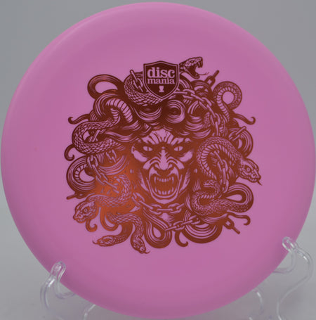 Discmania Exo Soft Lumen Link Medusa Stamp glow putter gripping chains at Maple Hill Disc Golf Course in Leicester, Massachusetts.