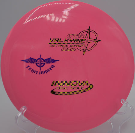 Player releasing a Star Valkyrie Team Stamp on a smooth hyzer-flip line at Milo McIver State Park Disc Golf Course in Estacada, Oregon.