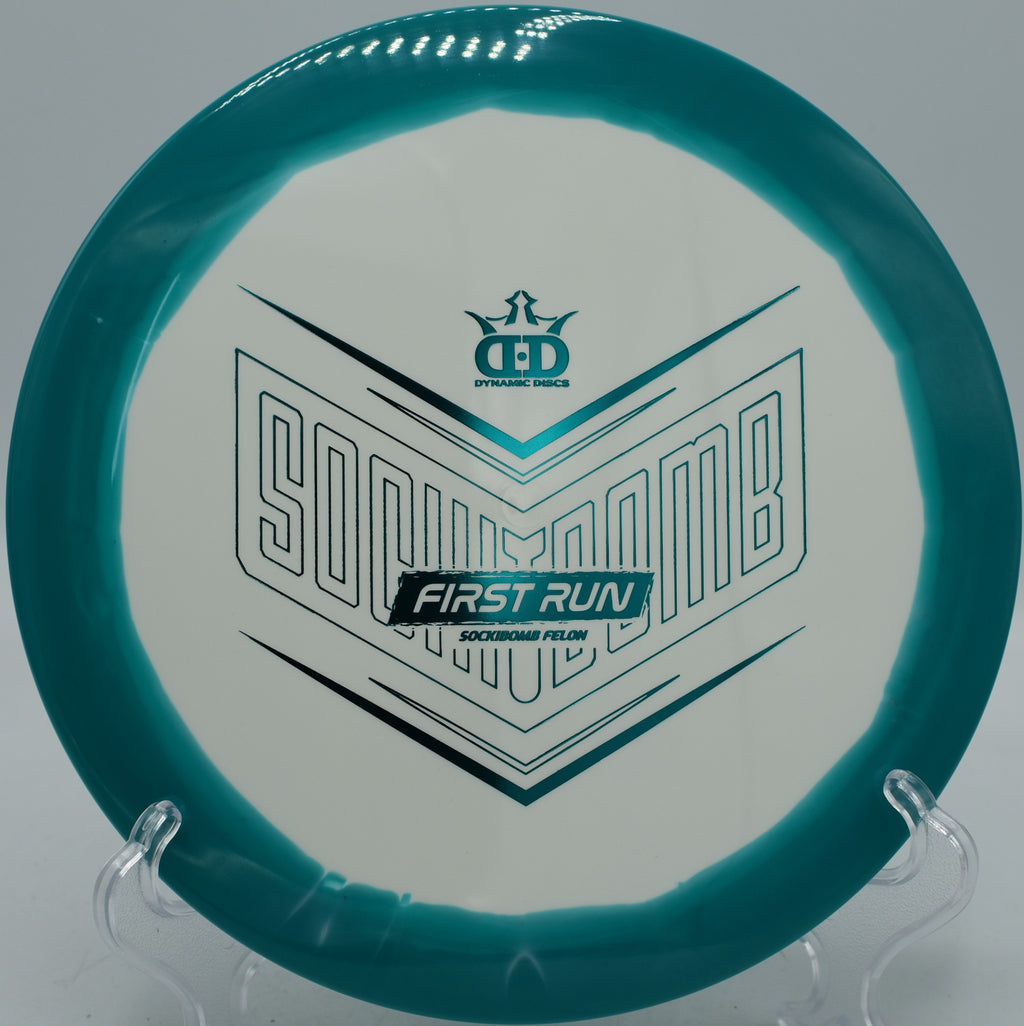 Dynamic Discs Sockibomb Felon Supreme Orbit First Run driver flying consistent fade at DeLaveaga Disc Golf Course in Santa Cruz, California.