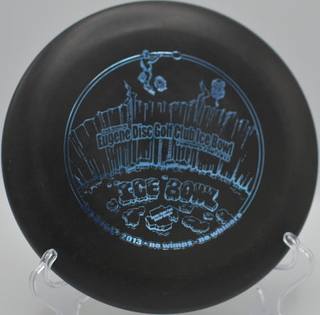 DX Aviar Driver (Penned AD) spinning smoothly toward the chains at Rollin Ridge Disc Golf Course in Reedsville, Wisconsin, during a calm afternoon round.