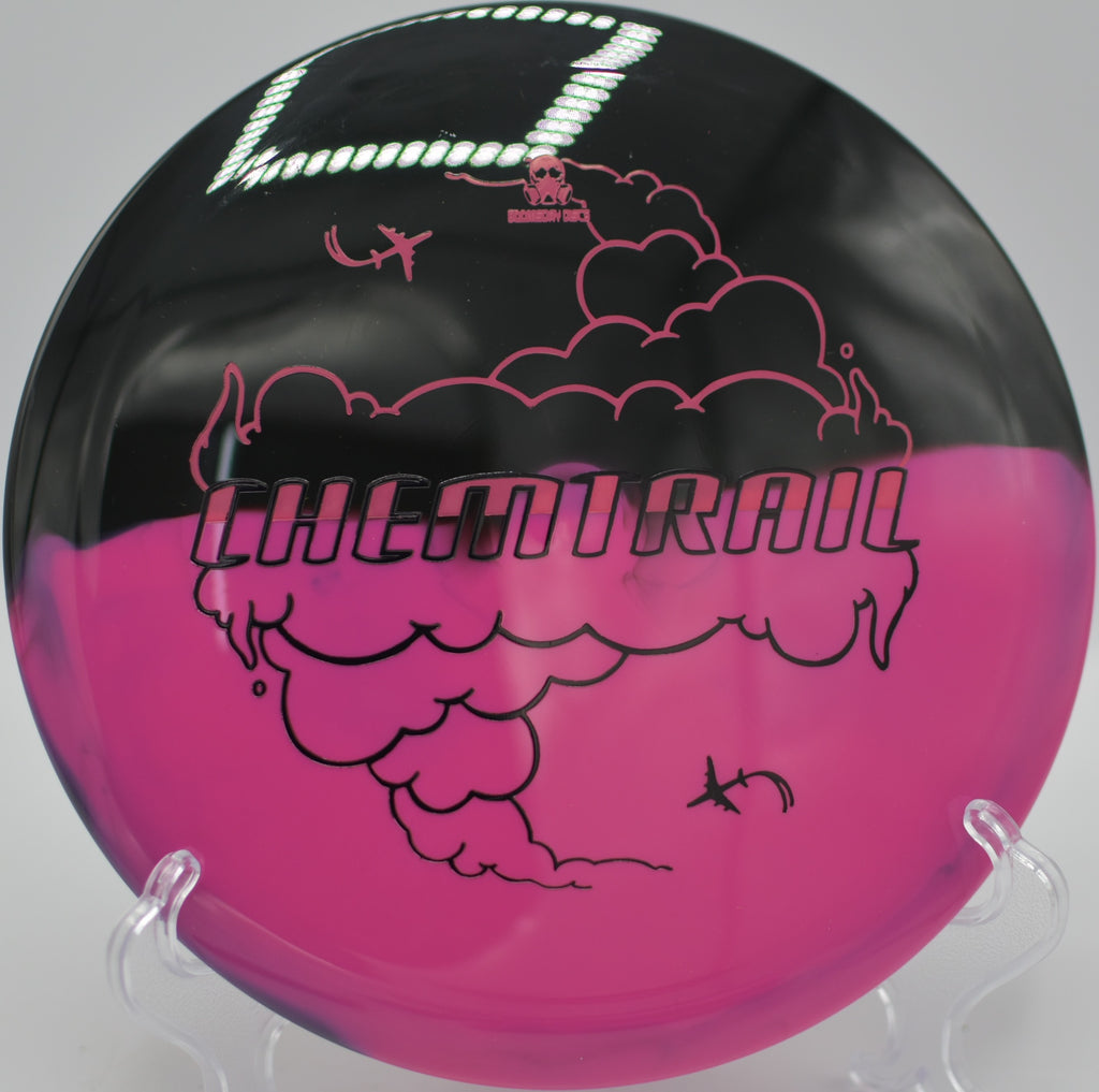 Retina Chemtrail carving a shaping line toward the basket at Earlwood Park Disc Golf Course in Columbia, South Carolina.