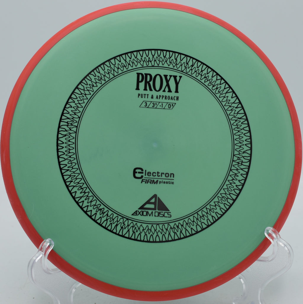 Axiom Electron Firm Proxy stable putter dropping into chains at Water Works Park Disc Golf Course in Kansas City, Missouri.