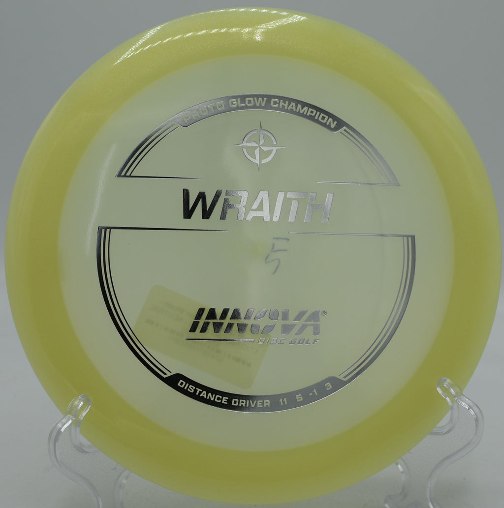 Proto Glow Wraith gliding on a controlled flex line at Blue Ribbon Pines Disc Golf Course in East Bethel, MN