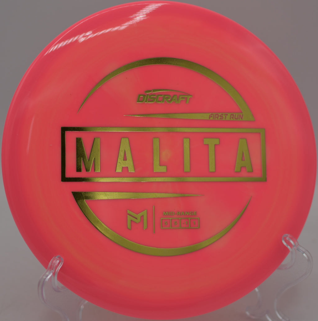 Discraft Malita gliding perfectly straight toward chains at Harmon Hills Disc Golf Course in Fall Branch, Tennessee.