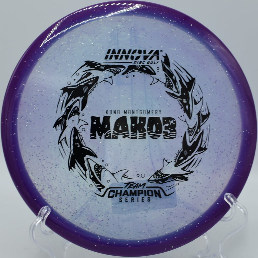 Innova Halo Champion Metal Flake Mako3 disc golf midrange gliding straight at DeLaveaga Disc Golf Course in Santa Cruz California