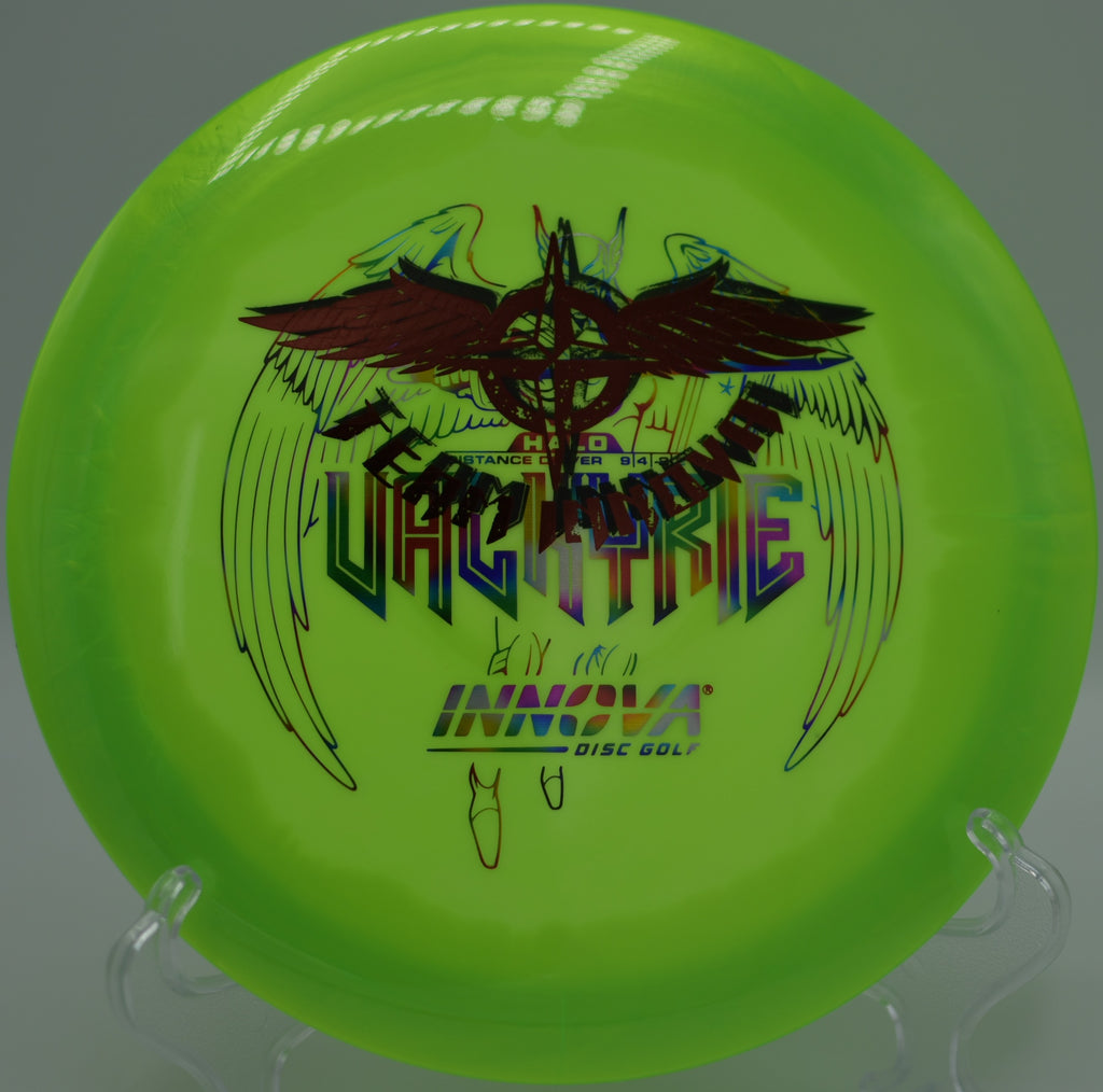 Innova Halo Star Valkyrie (Team Stamp) ripping through the air on a long, controlled turnover drive at Fountain Hills Disc Golf Course in Fountain Hills, Arizona.