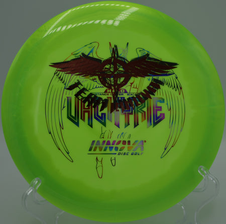 Innova Halo Star Valkyrie (Team Stamp) ripping through the air on a long, controlled turnover drive at Fountain Hills Disc Golf Course in Fountain Hills, Arizona.