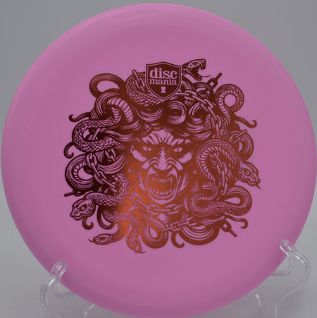 Soft Lumen Link Medusa Stamp Discmania beaded putter glowing under night lights at Idlewild Disc Golf Course in Burlington, Kentucky.