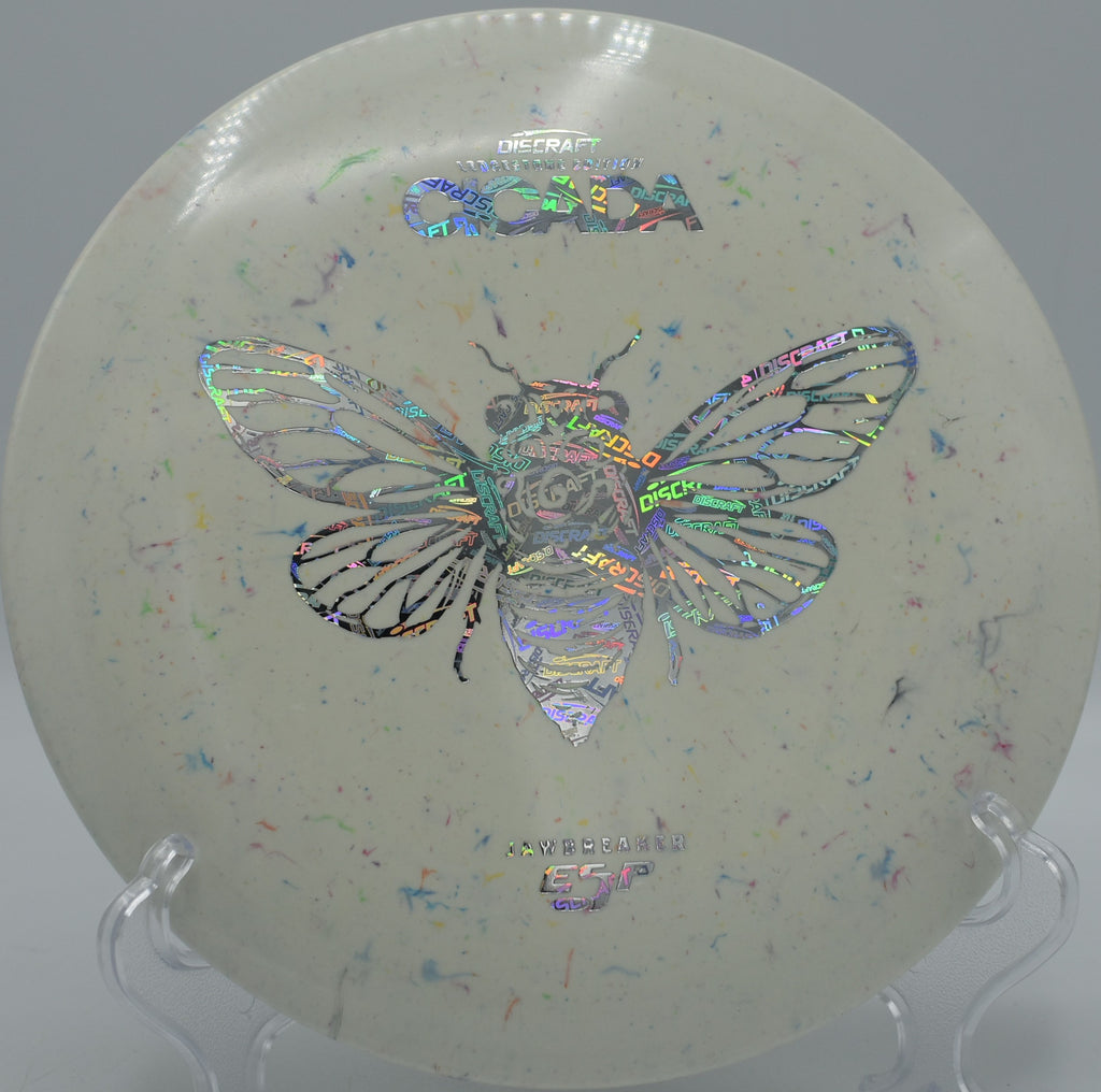 ESP Cicada in Jawbreaker plastic cutting through a light headwind at Water Works Park in Kansas City, Missouri, designed for consistent midrange touch.

