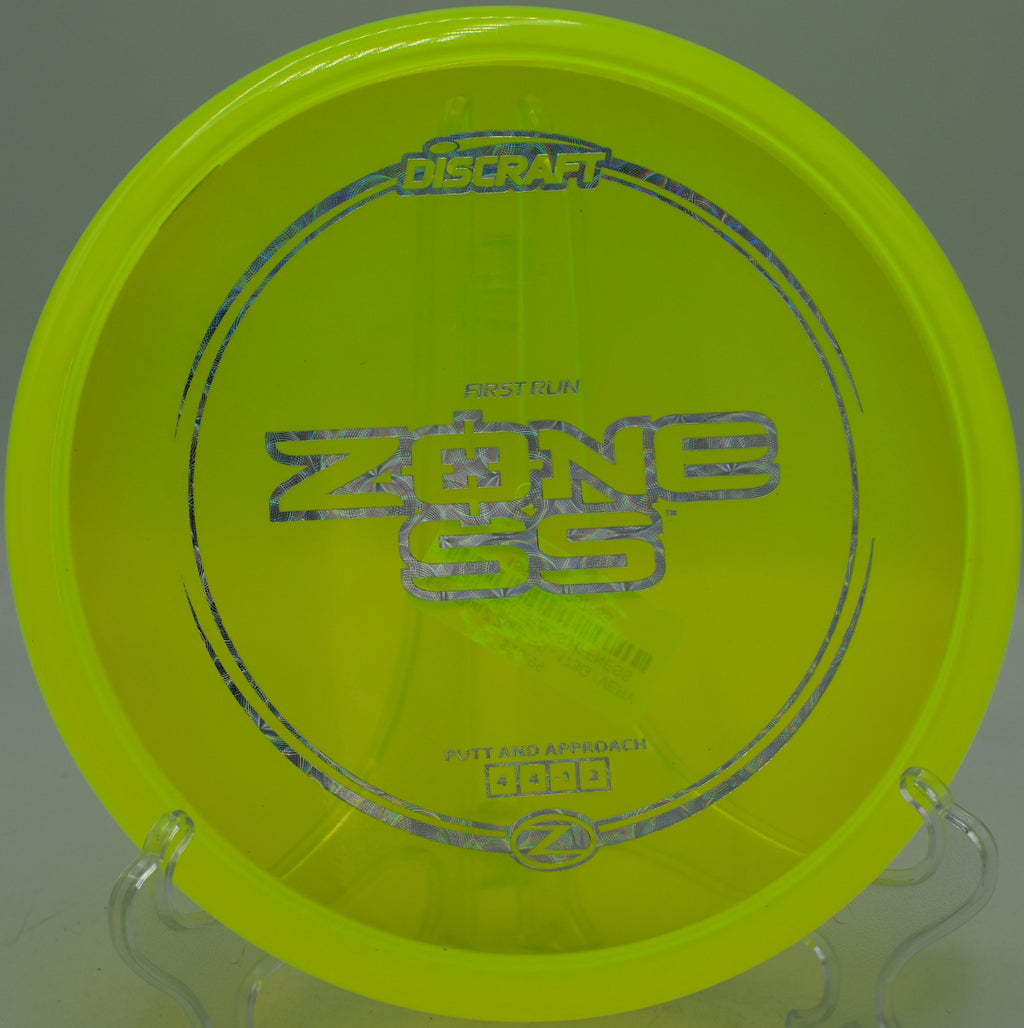 Discraft First Run Z Zone SS flying low skip shot at Fremont Park DGC in Sacramento, CA