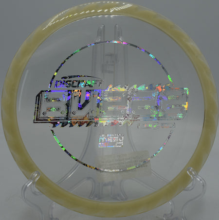 CryZtal FLX BuzzzSaw midrange with glowing mega rim at Maple Hill Disc Golf Course in Leicester, MA
