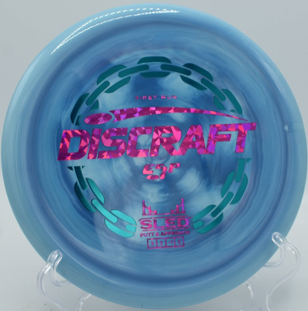 Discraft First Run ESP Sled precision approach disc landing softly at Toboggan Disc Golf Course in Milford, Michigan